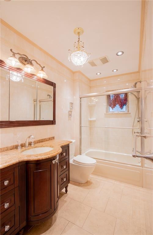 136 Bay Ridge Avenue Brooklyn, NY 11220 - Photo 28 of 48 a spacious bathroom with a sink double vanity and a mirror