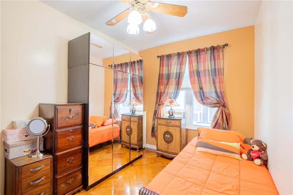 136 Bay Ridge Avenue Brooklyn, NY 11220 - Photo 34 of 48 a spacious bedroom with a bed and a large window