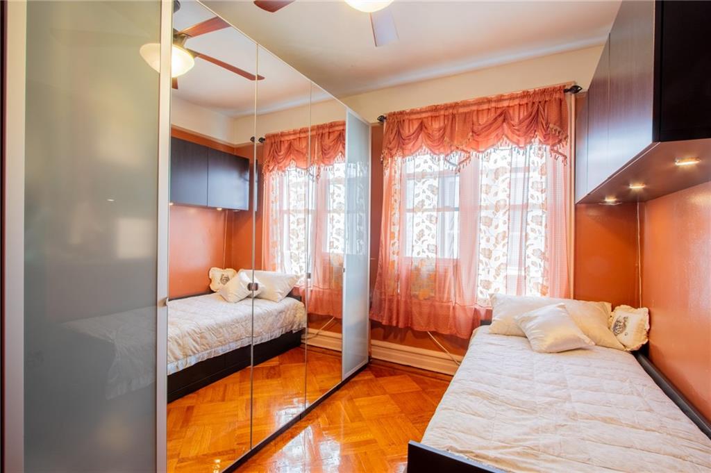 136 Bay Ridge Avenue Brooklyn, NY 11220 - Photo 10 of 48 a bedroom with bed and window