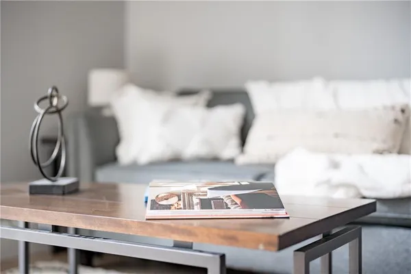 a bathroom with a stove a sink and a mirror