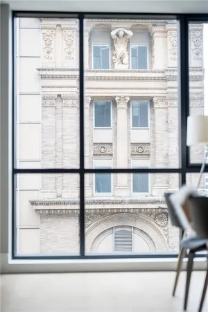 a view of a living room and window