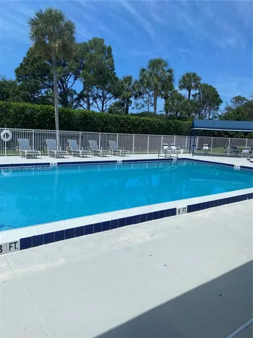 a view of a lake with a house