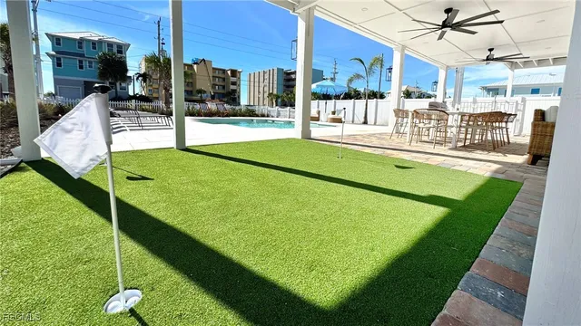 a front view of a building with garden