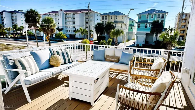 a view of a balcony with chairs