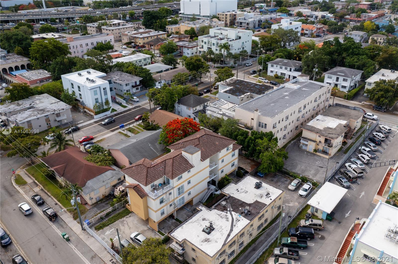 520 Southwest 5th Street, Unit 203 Miami, FL 33130 - Photo 45 of 51 an aerial view of a city with lots of residential buildings