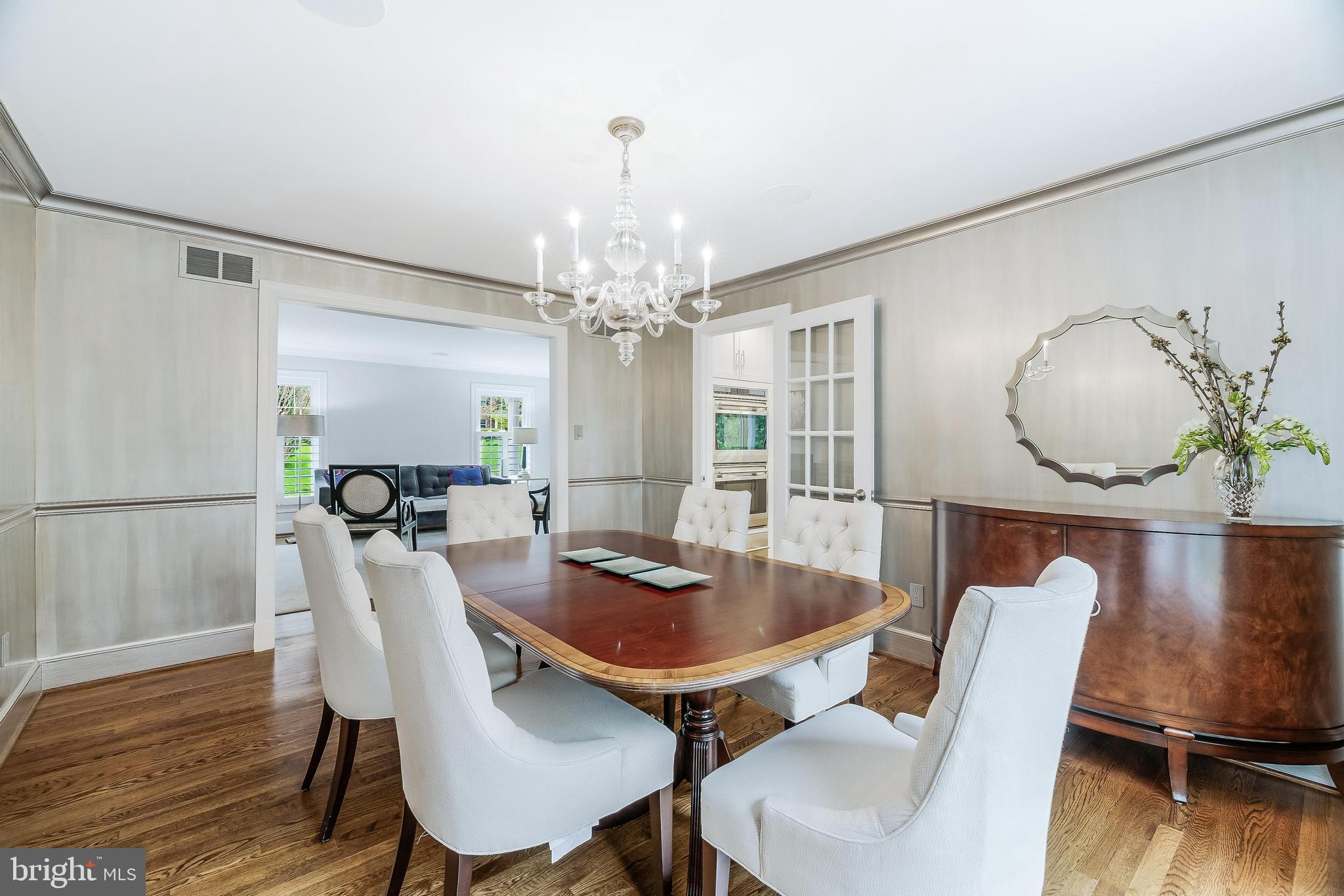 1205 Suffield Drive McLean, VA 22101 - Photo 13 of 76 a view of a dining room with furniture and wooden floor