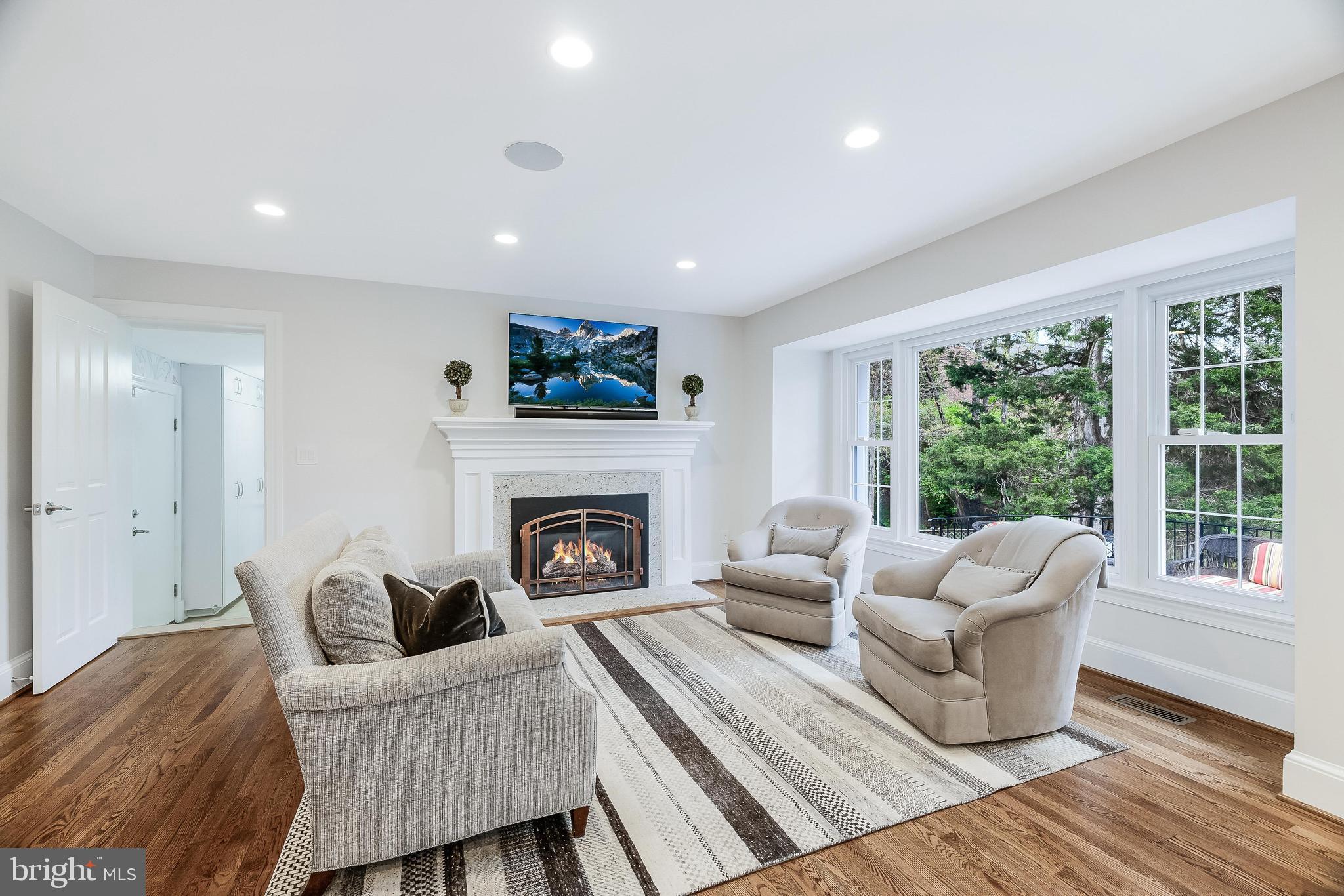 1205 Suffield Drive McLean, VA 22101 - Photo 25 of 76 a living room with furniture and a fireplace