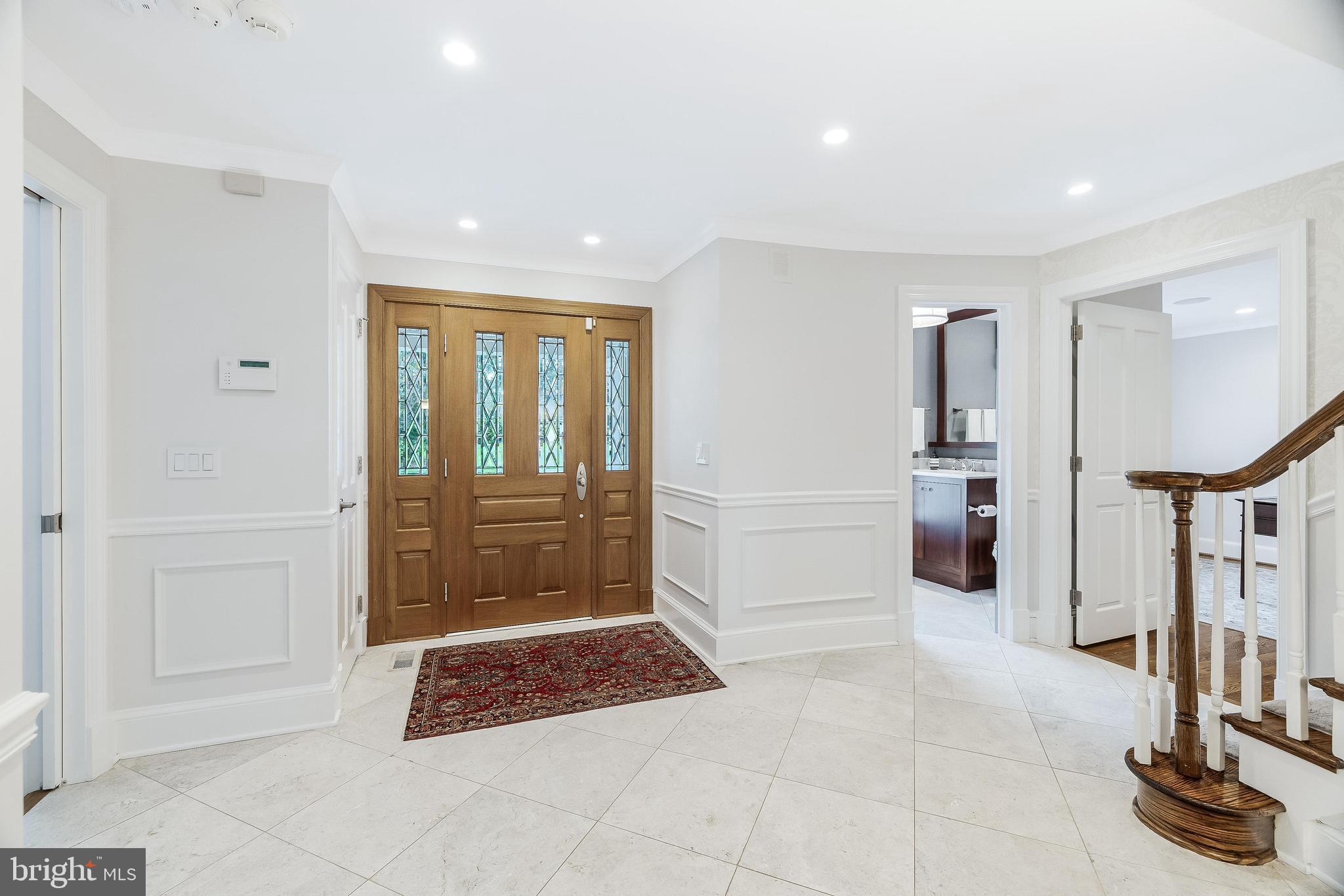 1205 Suffield Drive McLean, VA 22101 - Photo 5 of 76 a bathroom with a mirror and a shower