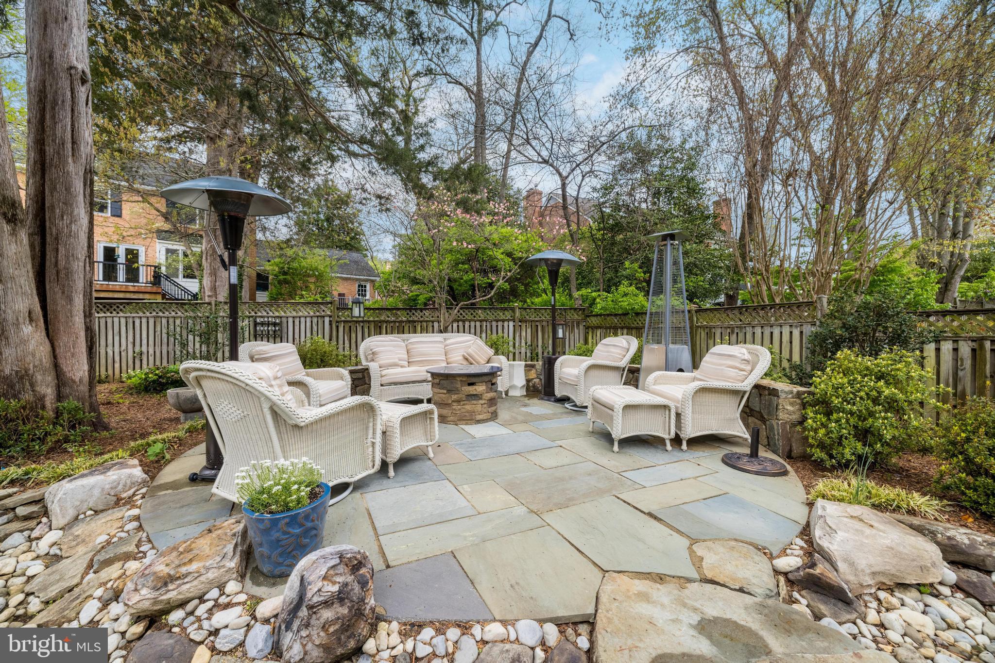 1205 Suffield Drive McLean, VA 22101 - Photo 65 of 76 a view of a patio with couches table and chairs and potted plants