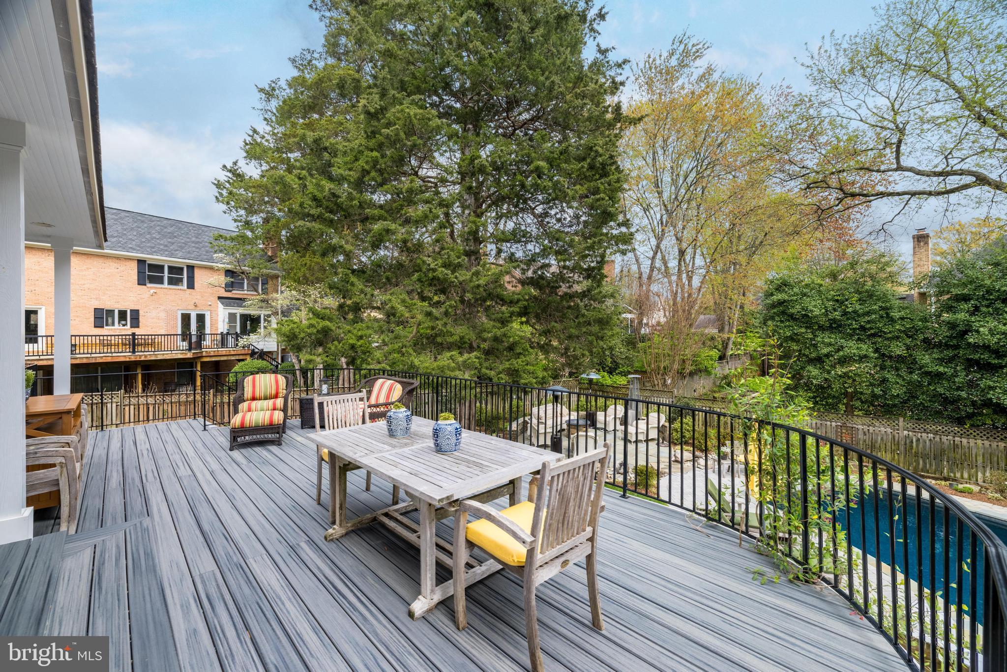 1205 Suffield Drive McLean, VA 22101 - Photo 67 of 76 a wooden bench sitting on top of a wooden deck