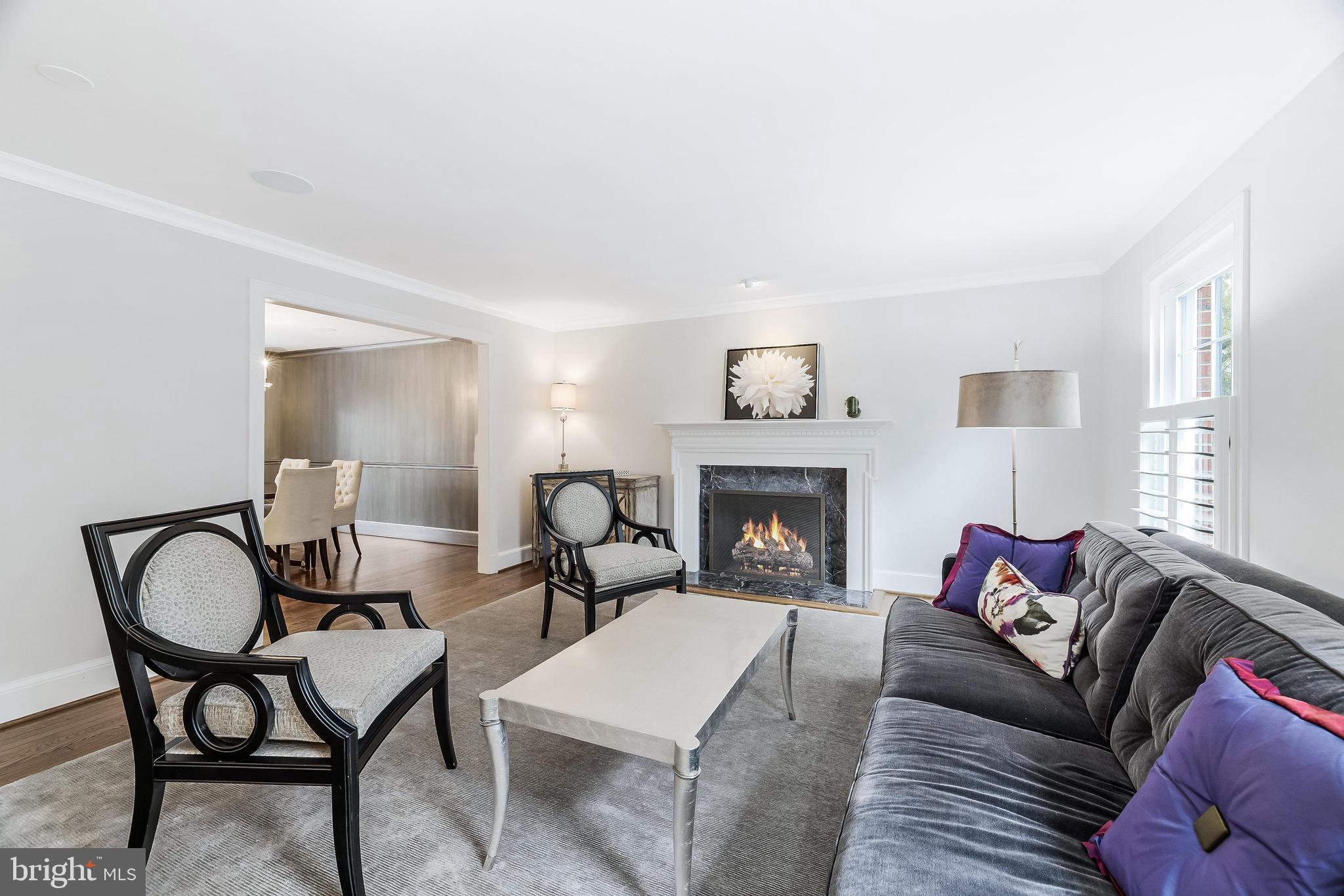 1205 Suffield Drive McLean, VA 22101 - Photo 10 of 76 a living room with furniture and a fireplace
