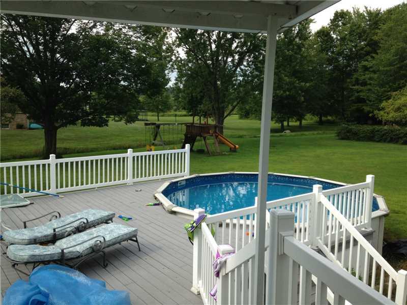 4378 Seneca Road Sharpsville, PA 16150 - Photo 5 of 24 Exterior Back. Back deck and pool from sunroom