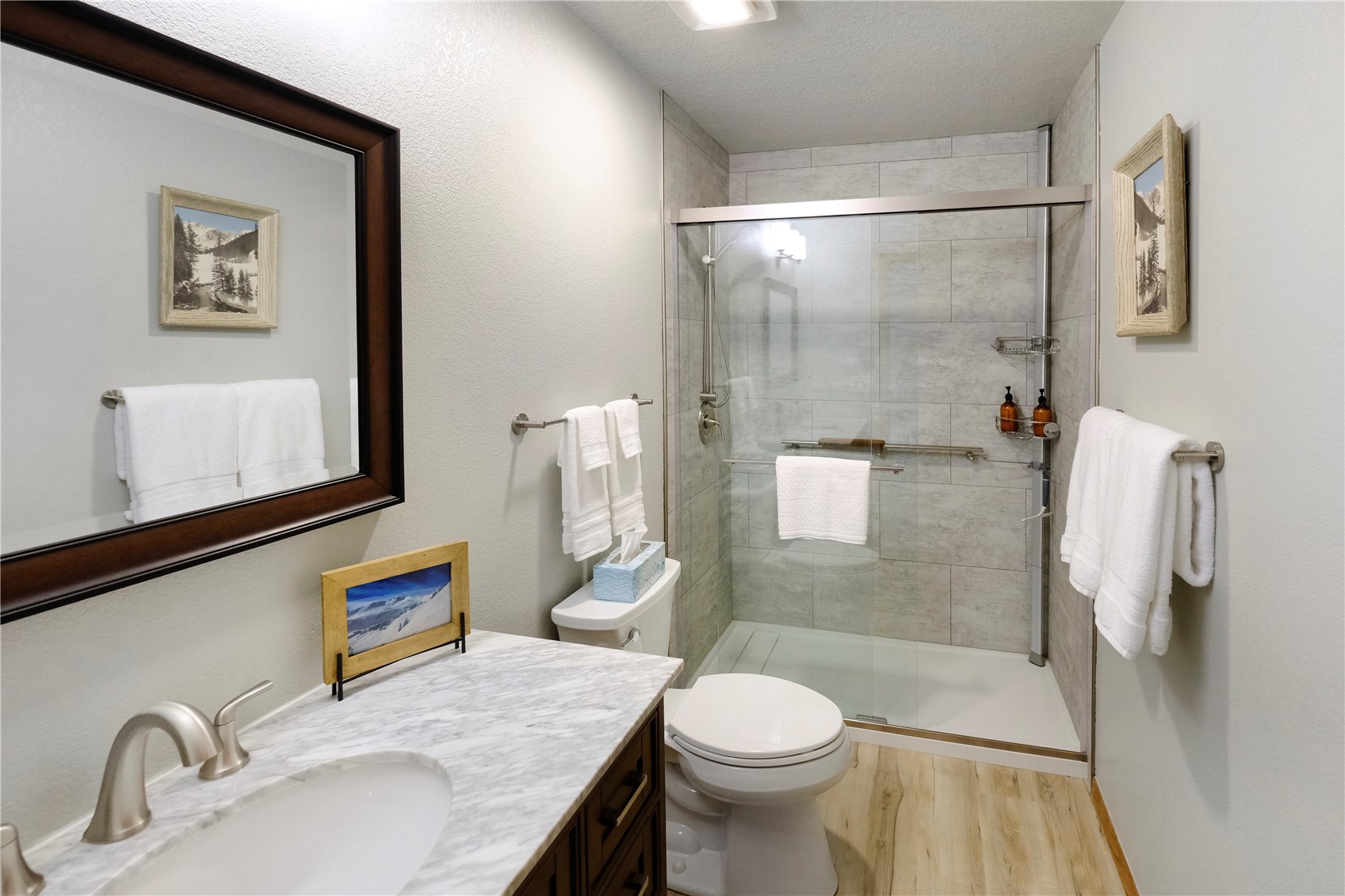 23034 Highway 6, Unit 305 Keystone, CO 80435 - Photo 12 of 27 a bathroom with a granite countertop sink toilet and shower