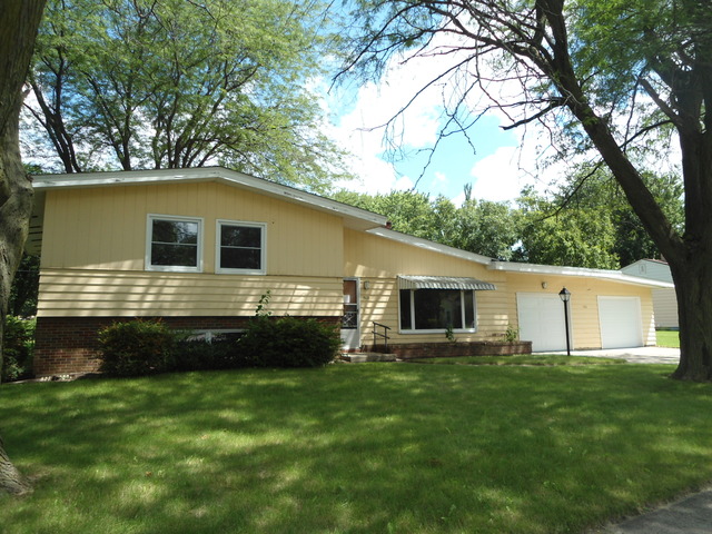 503 Cleveland Avenue Rochelle, IL 61068 - Photo 1 of 13 a house view with a garden space