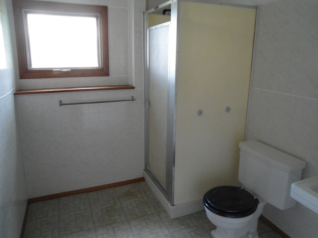 503 Cleveland Avenue Rochelle, IL 61068 - Photo 7 of 13 a bathroom with a toilet and a sink