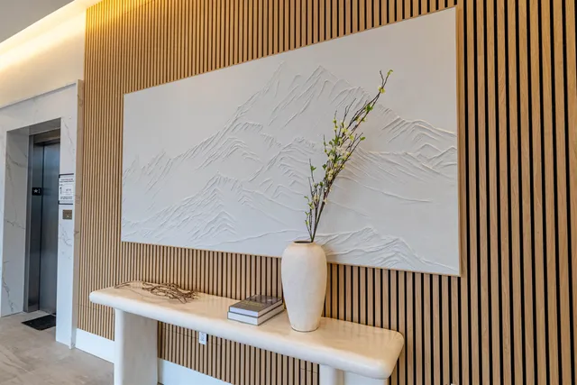 a view of a balcony with wooden floor