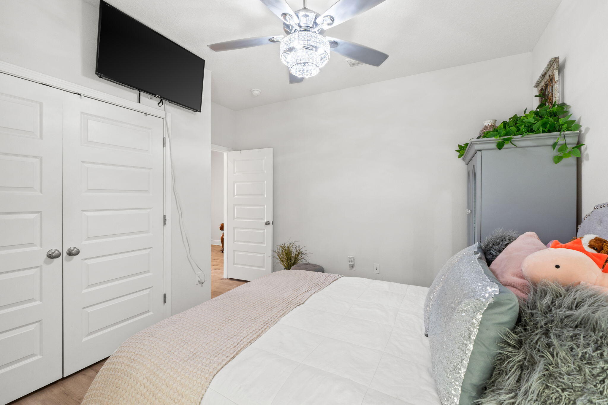 44 Secluded Circle Freeport, FL 32439 - Photo 11 of 43 a bedroom with a bed and a flat tv screen