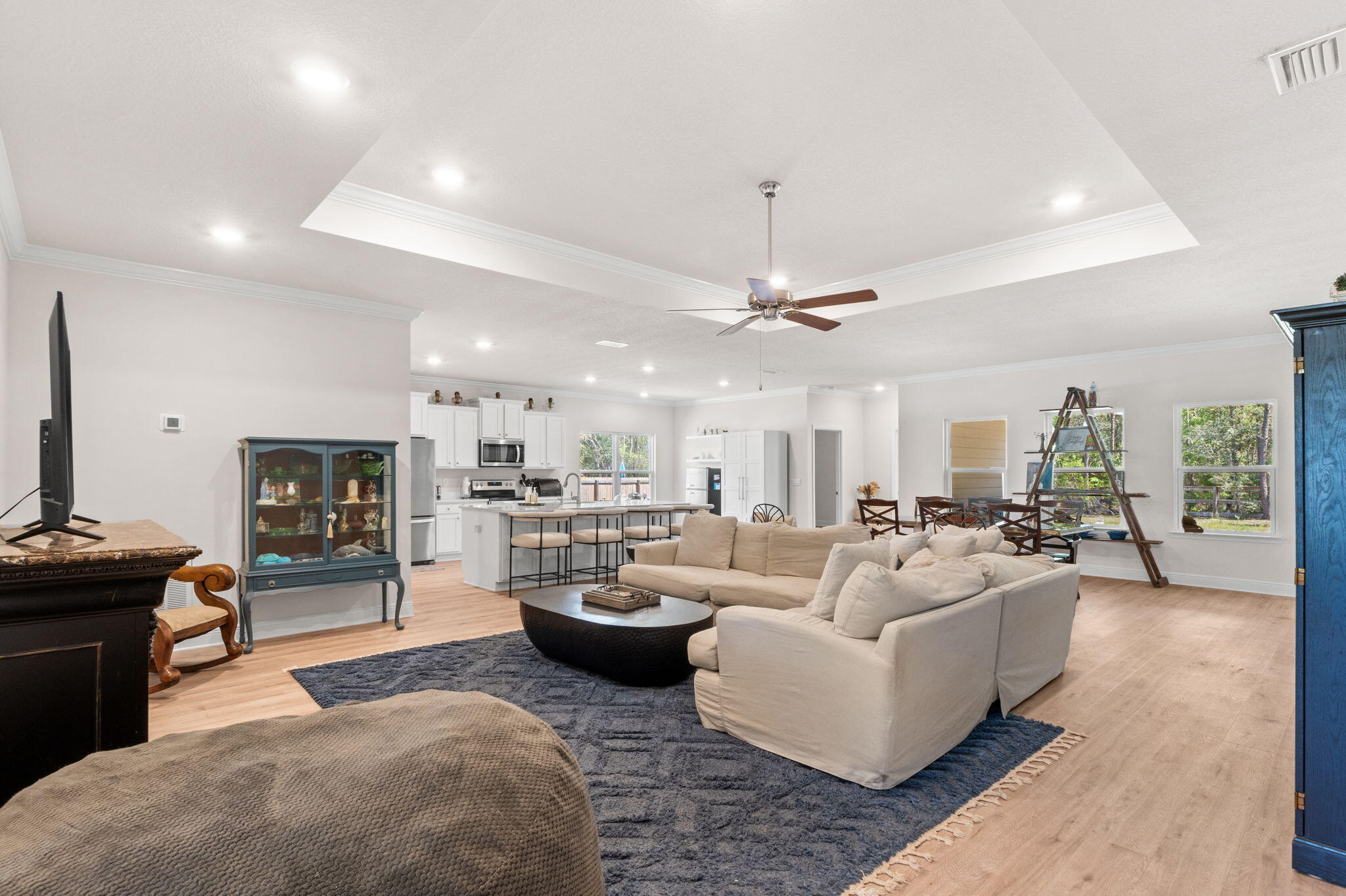 44 Secluded Circle Freeport, FL 32439 - Photo 12 of 43 a living room with furniture kitchen view and a chandelier