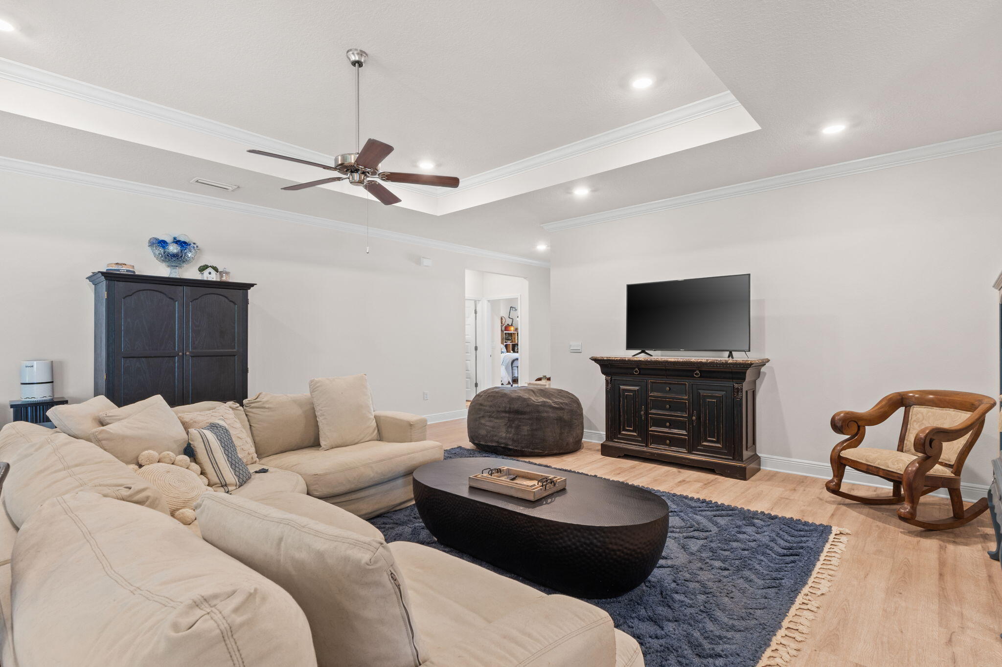 44 Secluded Circle Freeport, FL 32439 - Photo 14 of 43 a living room with furniture a flat screen tv and a fireplace