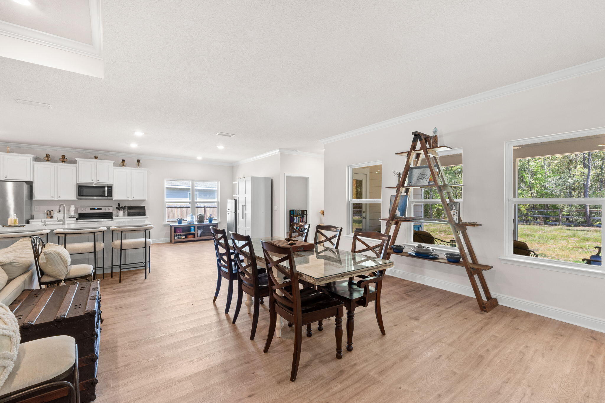 44 Secluded Circle Freeport, FL 32439 - Photo 16 of 43 a view of a dining room with furniture window and wooden floor