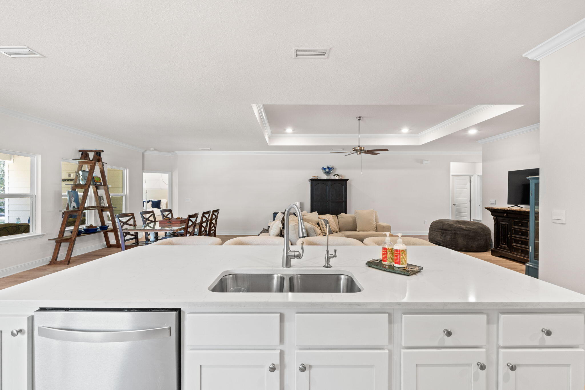 44 Secluded Circle Freeport, FL 32439 - Photo 22 of 43 a kitchen with a sink and white cabinets