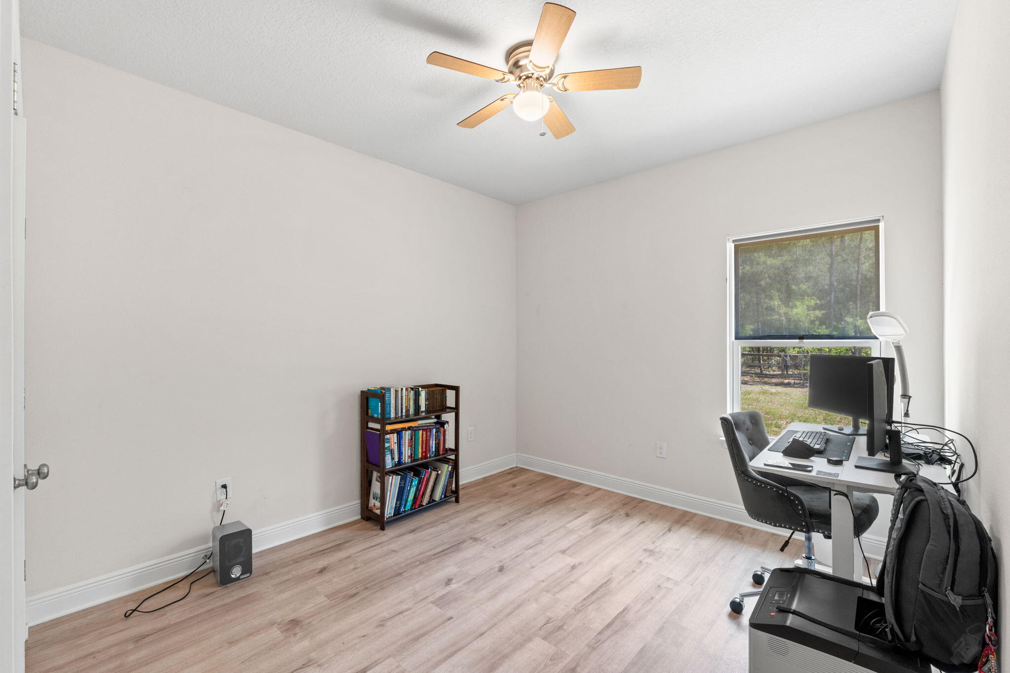 44 Secluded Circle Freeport, FL 32439 - Photo 26 of 43 a view of a workspace with furniture and a window