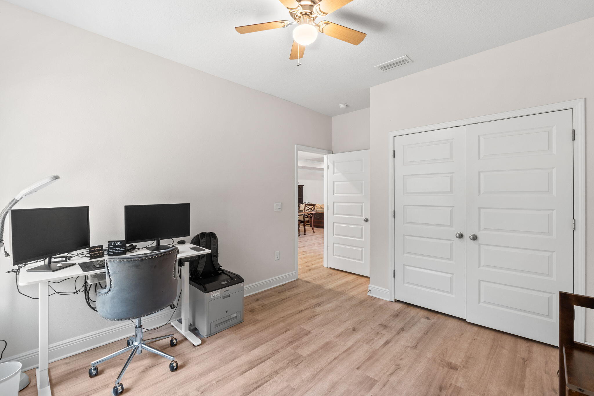 44 Secluded Circle Freeport, FL 32439 - Photo 27 of 43 a view of a workspace with furniture and a ceiling fan