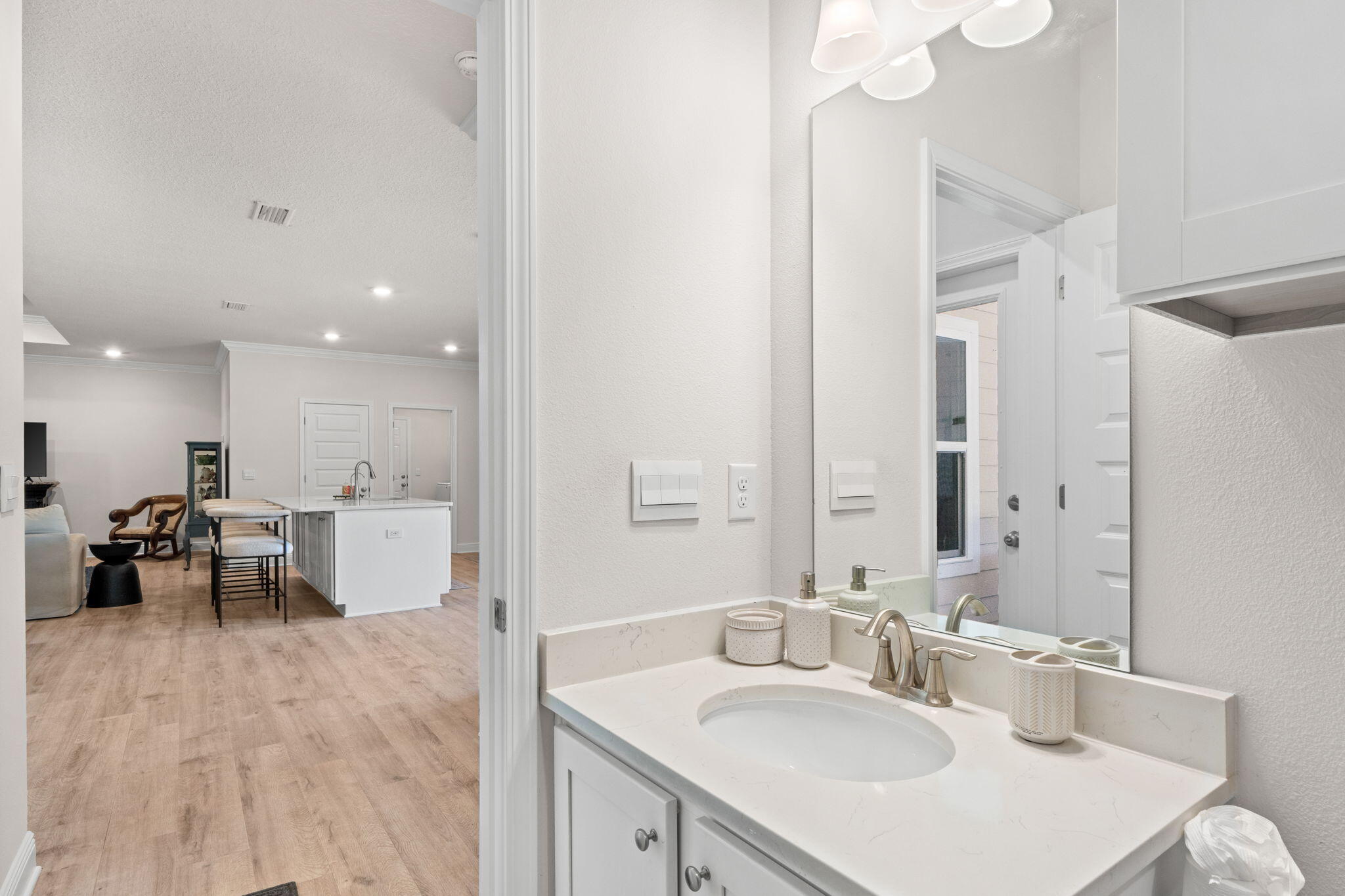 44 Secluded Circle Freeport, FL 32439 - Photo 29 of 43 a bathroom with a double vanity sink mirror and double