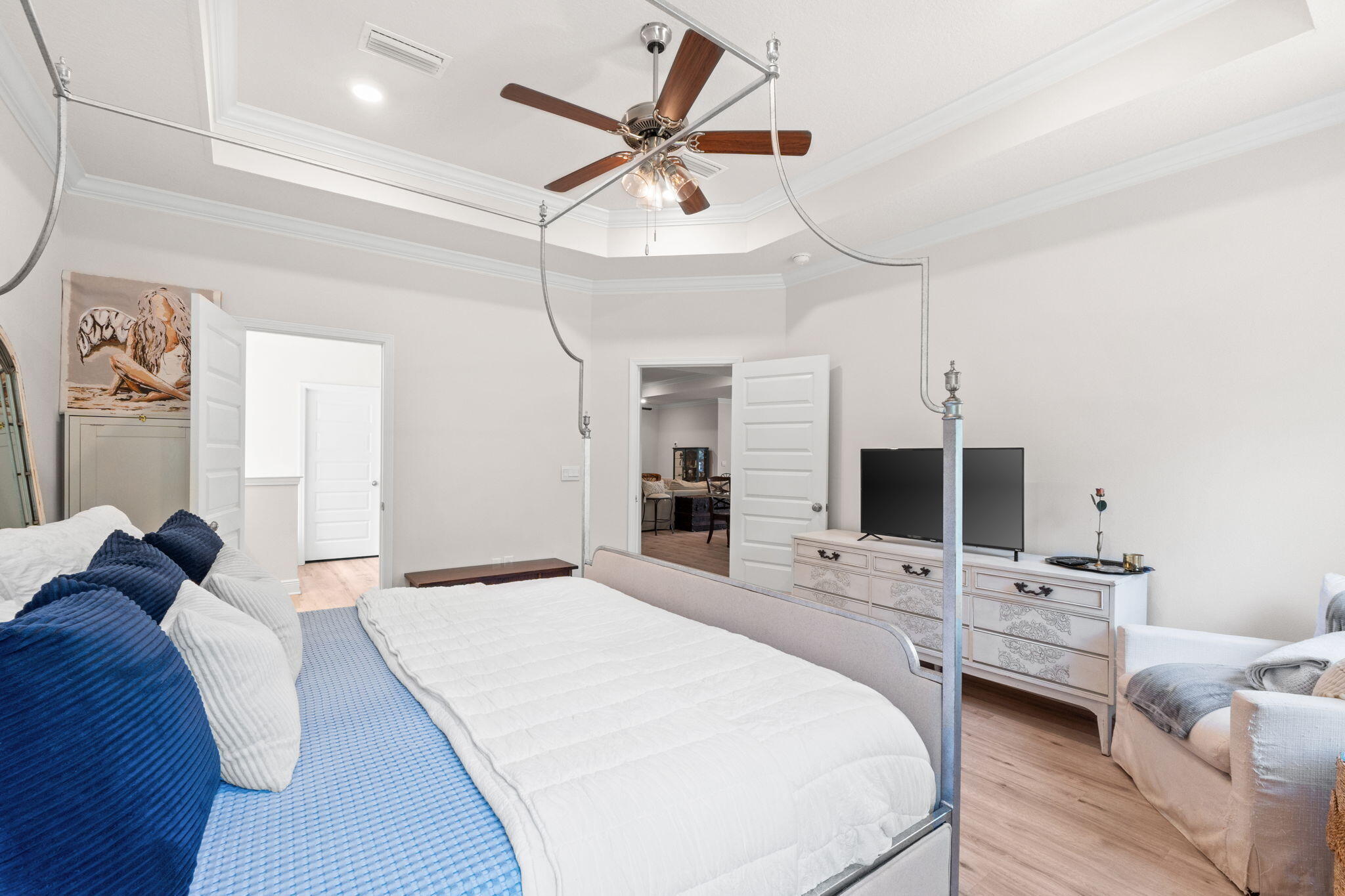 44 Secluded Circle Freeport, FL 32439 - Photo 32 of 43 a bedroom with a bed window and a flat screen tv