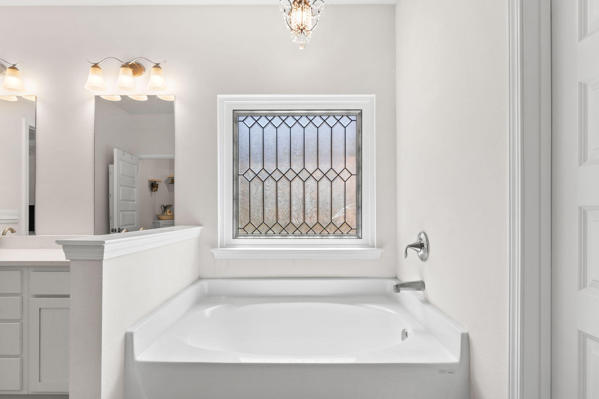 44 Secluded Circle Freeport, FL 32439 - Photo 36 of 43 a white bath tub sitting next to a white sink