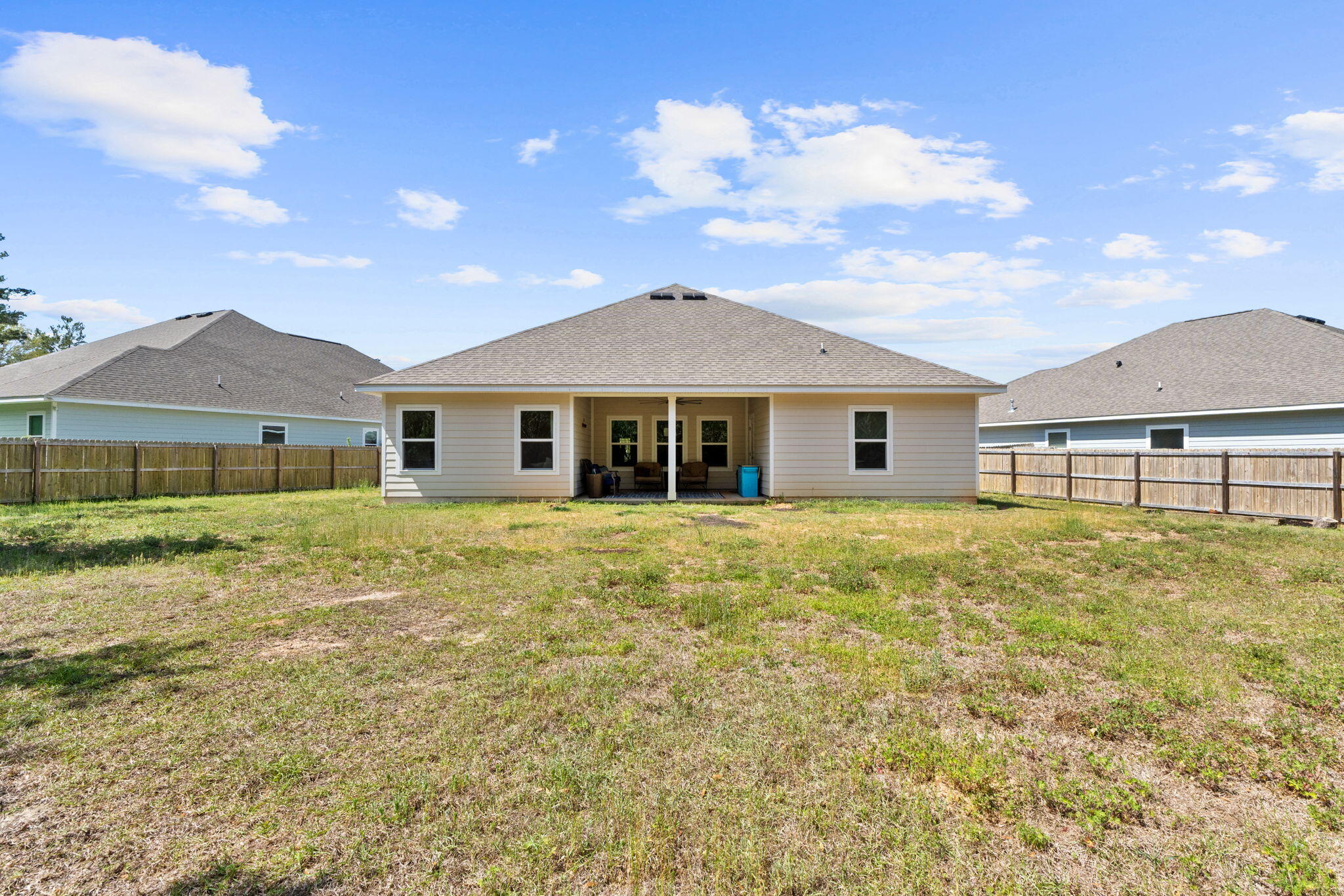44 Secluded Circle Freeport, FL 32439 - Photo 42 of 43 a front view of a house with a garden