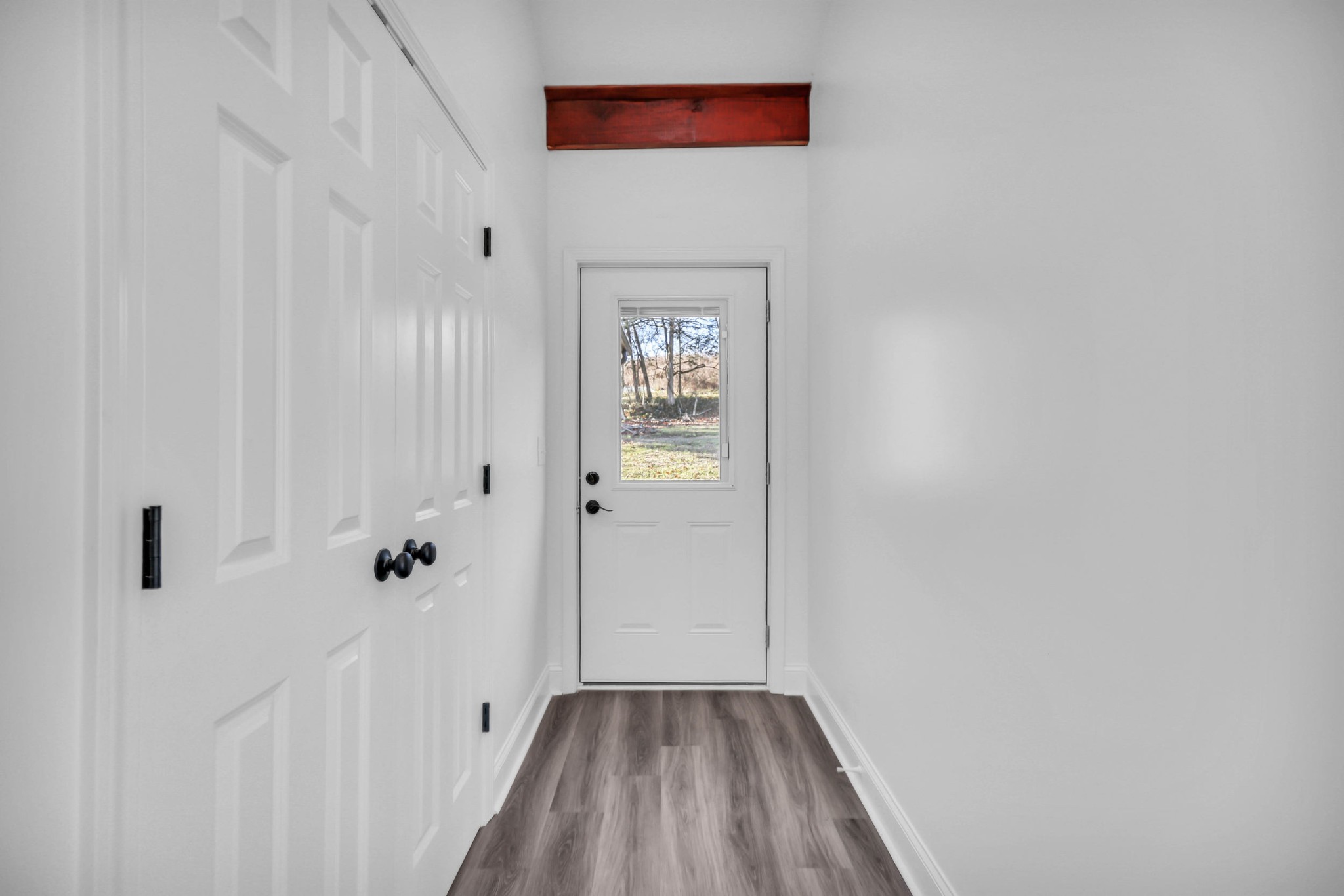 1399 Saundersville Road Hendersonville, TN 37075 - Photo 24 of 56 a view of a hallway with wooden floor