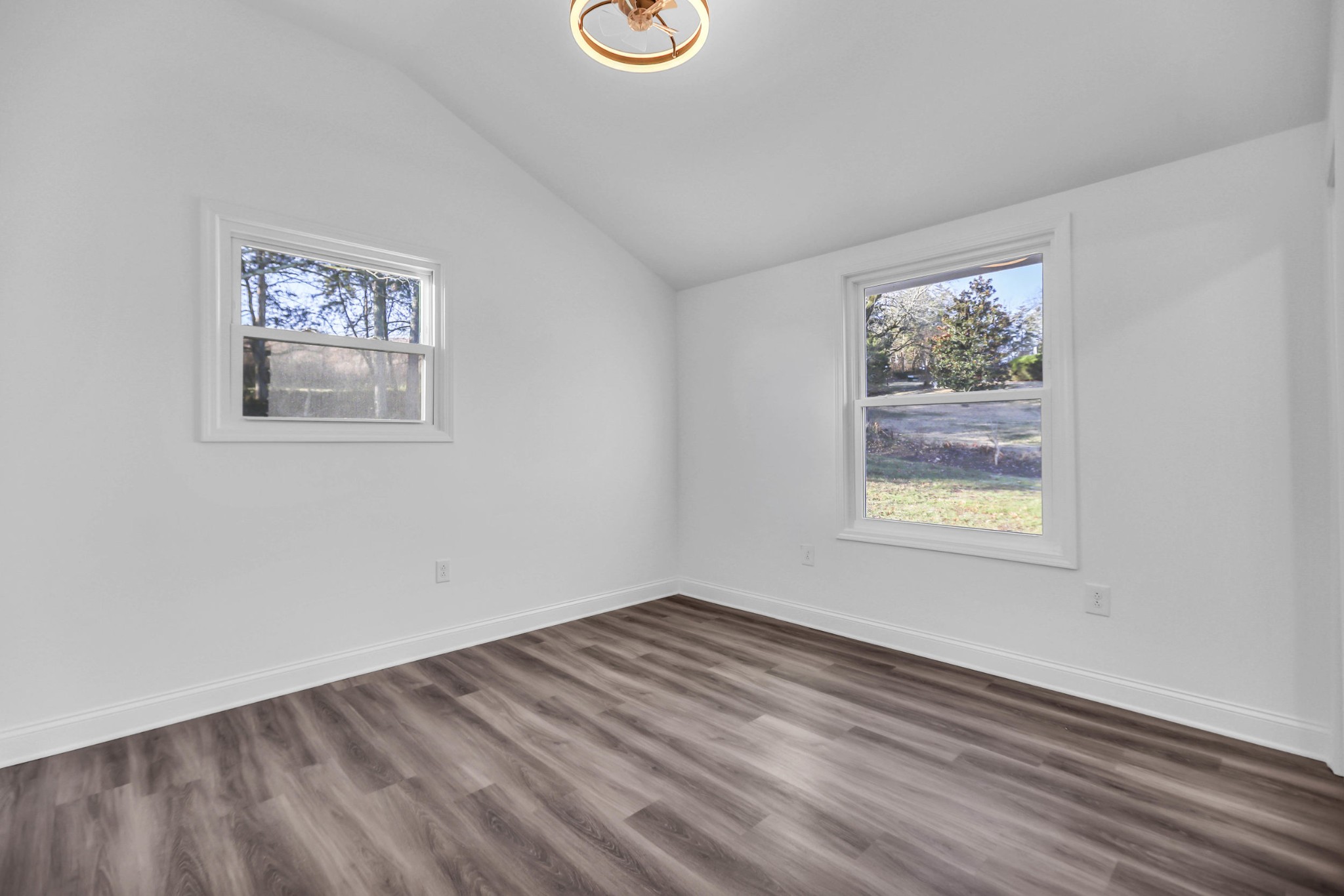 1399 Saundersville Road Hendersonville, TN 37075 - Photo 25 of 56 a view of an empty room with window and wooden floor