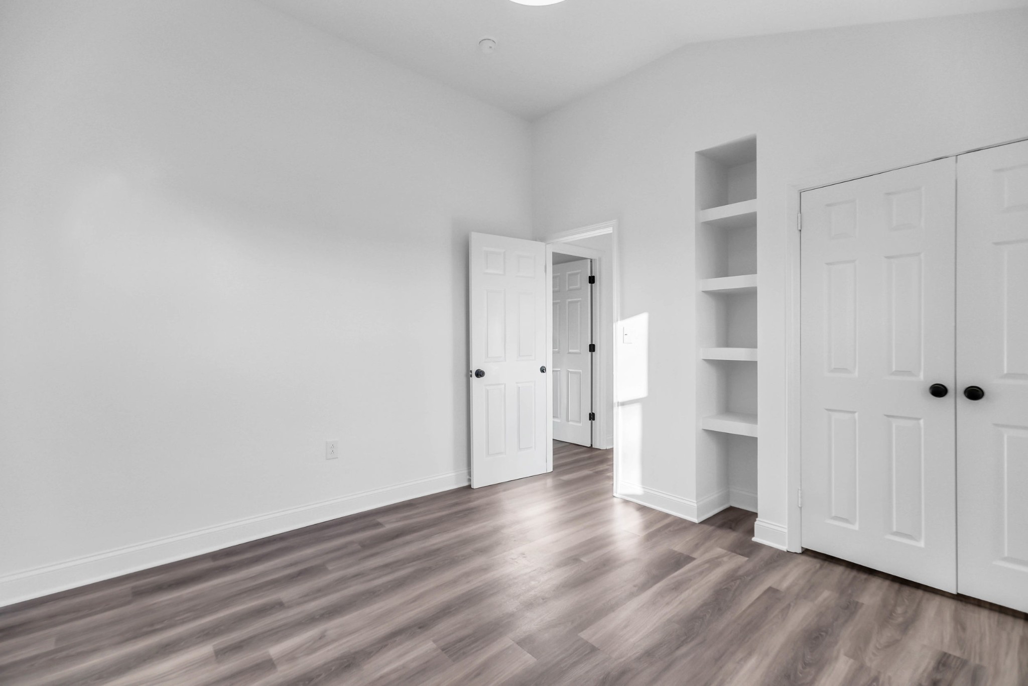 1399 Saundersville Road Hendersonville, TN 37075 - Photo 32 of 56 a view of an empty room with wooden floor