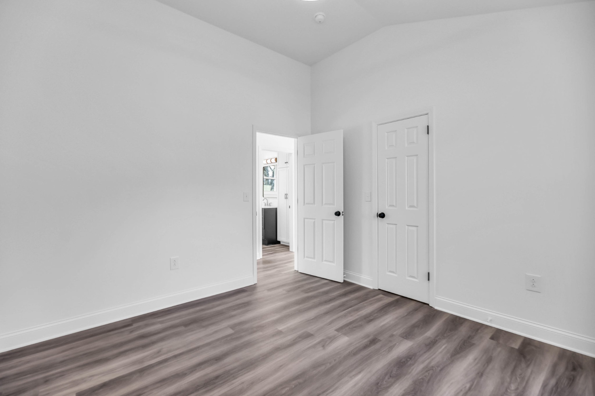 1399 Saundersville Road Hendersonville, TN 37075 - Photo 36 of 56 a view of an empty room with wooden floor