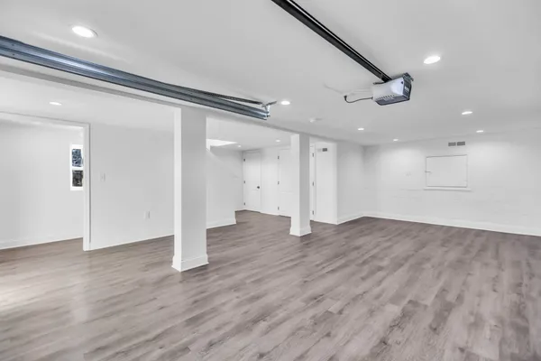 a swimming pool with yard and outdoor seating