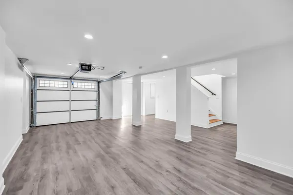 a front view of a house with a garage