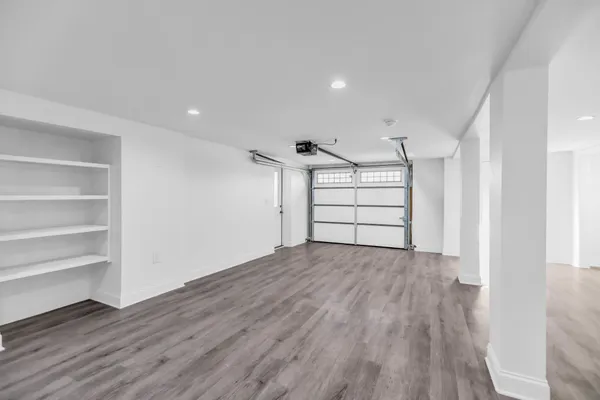 a front view of a house with a yard table and chairs