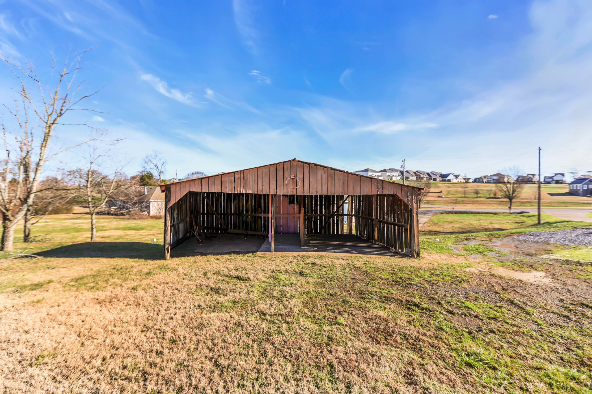 1399 Saundersville Road Hendersonville, TN 37075 - Photo 52 of 56 a view of a house with a yard