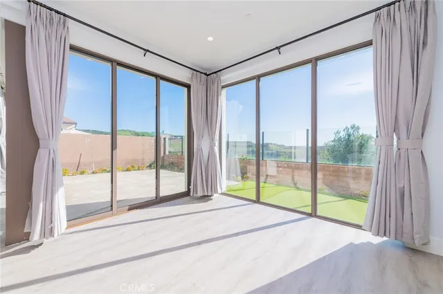 a view of a room with a large window