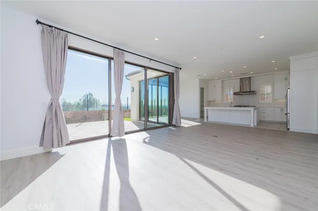 a spacious bathroom with a tub and shower