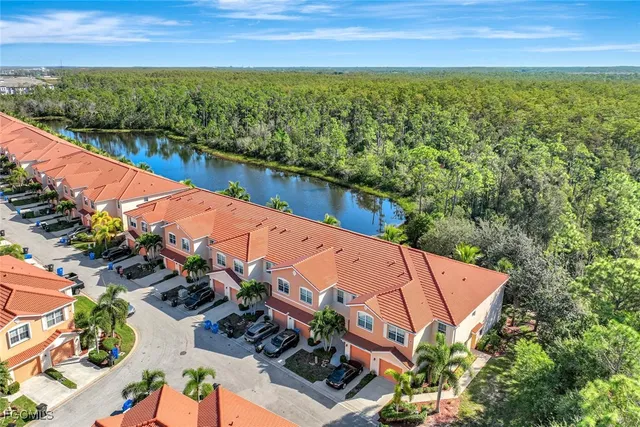 a view of a city with a lake