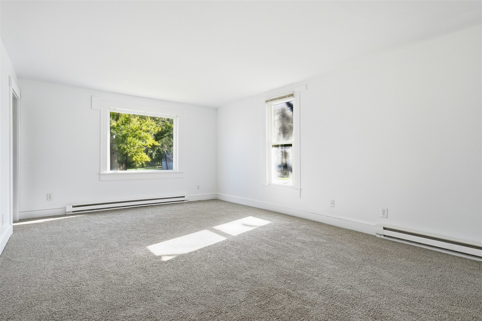 305 South Perry Street Carlock, IL 61725 - Photo 11 of 30 an empty room with windows