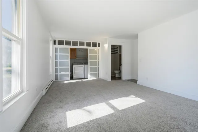 an empty room with windows