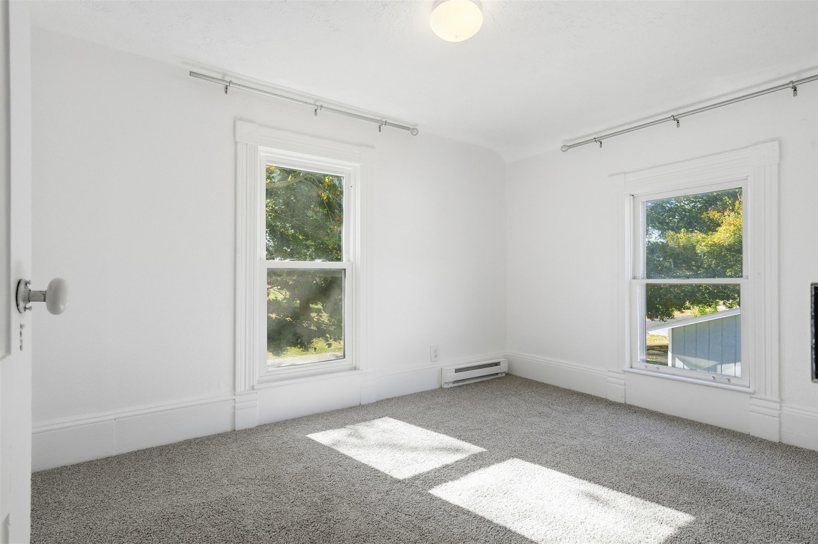 305 South Perry Street Carlock, IL 61725 - Photo 18 of 30 an empty room with windows