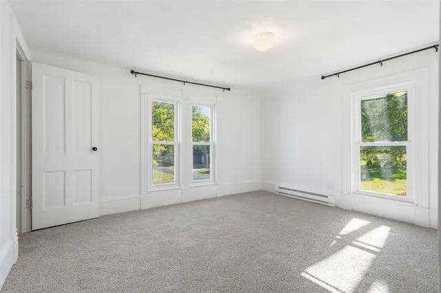 an empty room with windows