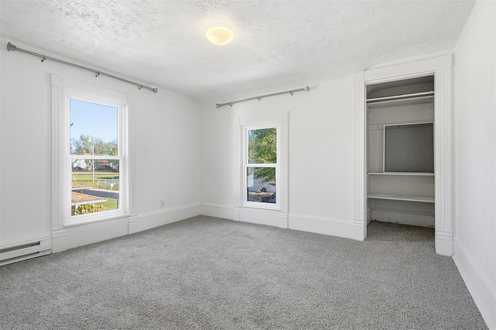305 South Perry Street Carlock, IL 61725 - Photo 21 of 30 a view of an empty room with a window