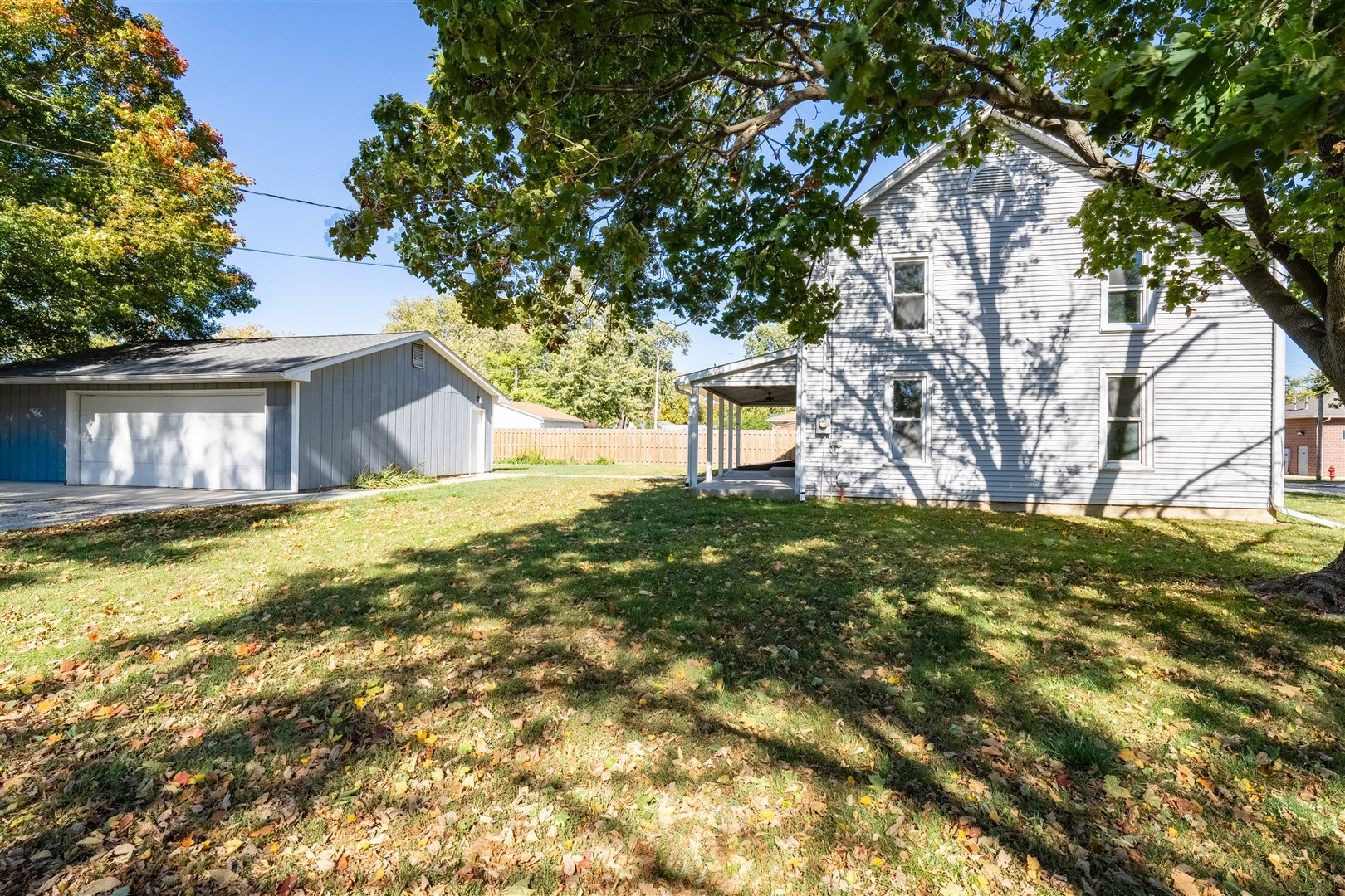 305 South Perry Street Carlock, IL 61725 - Photo 25 of 30 a house with swimming pool in front of it