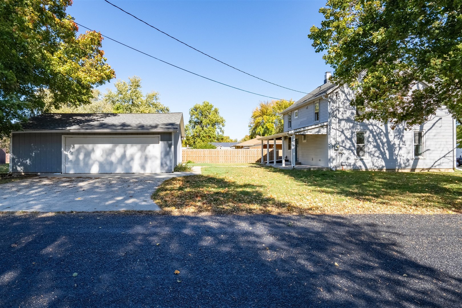 305 South Perry Street Carlock, IL 61725 - Photo 30 of 30 a view of a yard with wooden fence