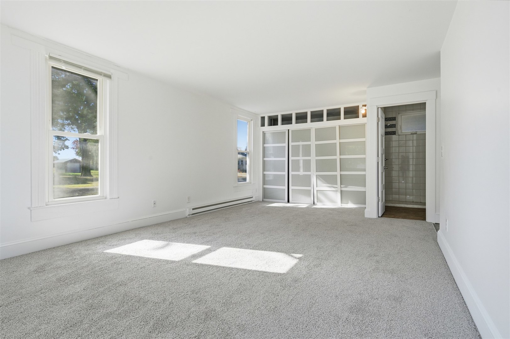 305 South Perry Street Carlock, IL 61725 - Photo 9 of 30 an empty room with windows